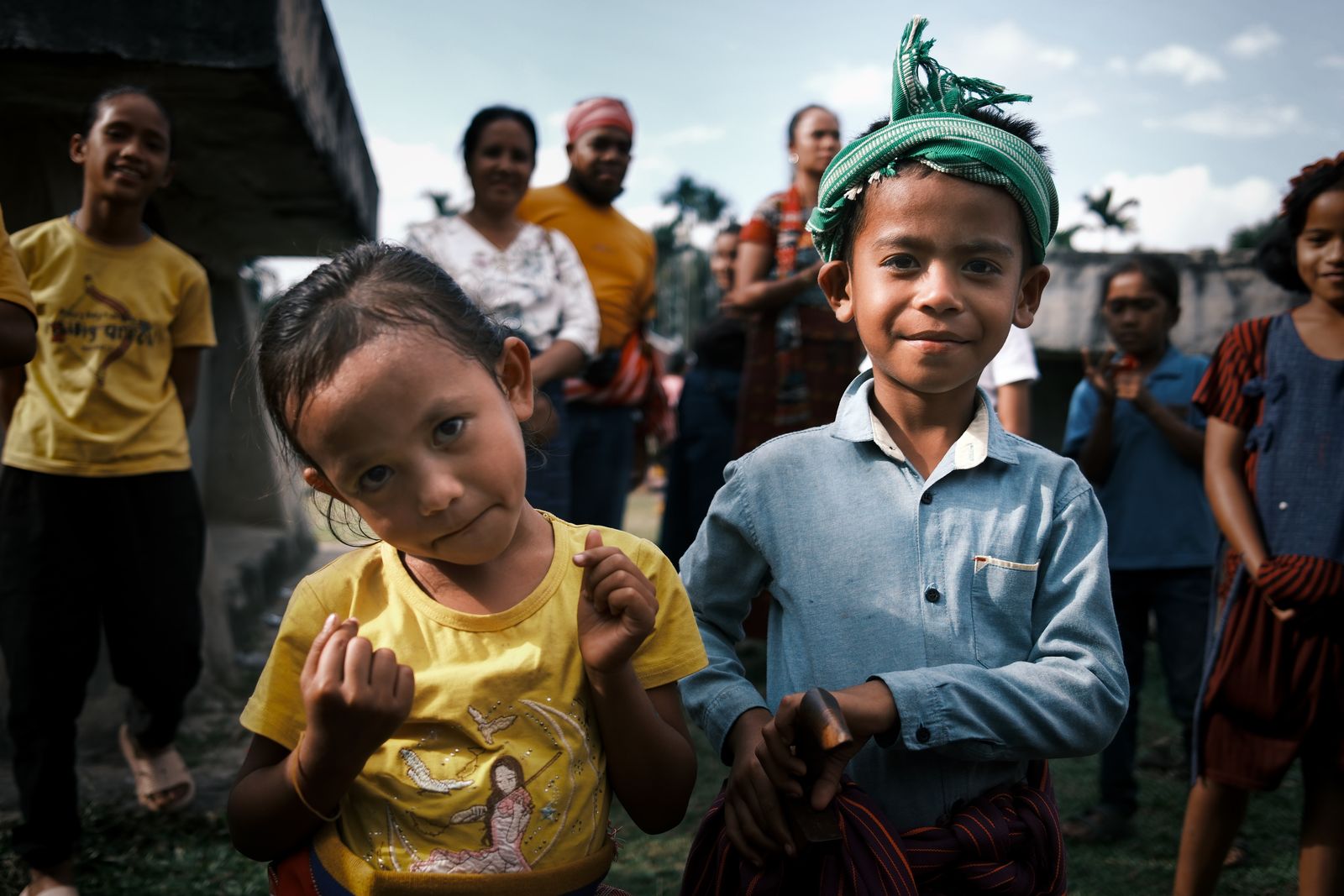 A crowd of children walking together toward the camera